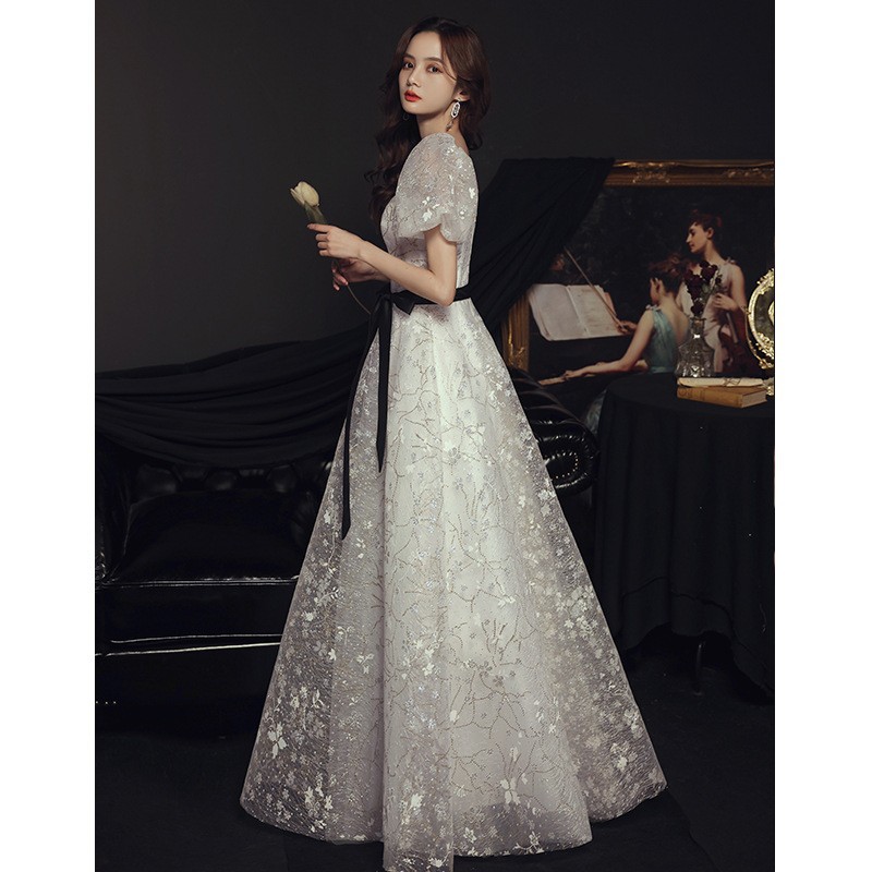 Vestido de noche para banquete, nuevo estilo 2026, blanco, estilo francés, elegante, de hada, largo, con falda abullonada, para fiesta anual.