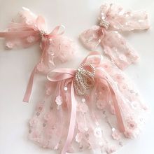 厂家直销儿童蝴蝶结发夹新款甜美粉色系仙花片蕾丝飘带珍珠女代发