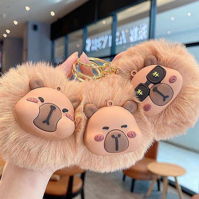 Animal de dibujos animados Kapibara peluche bola lindo peluche delfín tridimensional bolsa suave colgante llavero