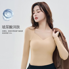 秋冬の美肌の服は保温して胸のパッドの中で肉色の底のシャツの筋肉の底の上着の超薄い低い襟のステルスの秋の服をつけます。