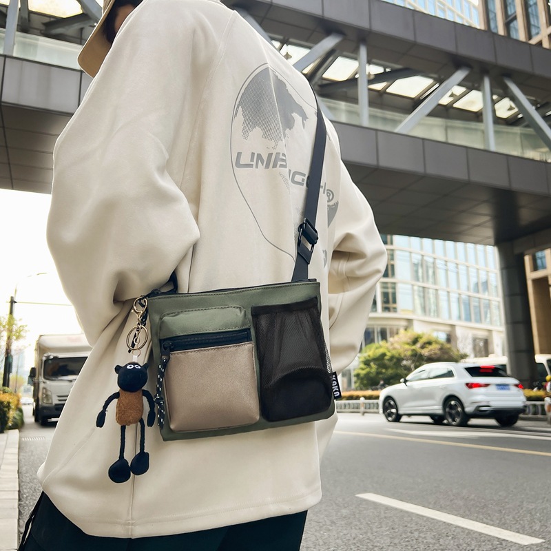 Bolso de hombro transfronterizo de gran capacidad, bolso de correo universal, bolso coreano, bolso de estilo casual, bolso de mano para hombres y mujeres.