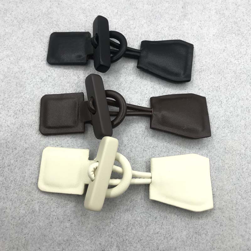 厂家直销新款方形绳扣可调节树脂皮对扣大衣风服装外套