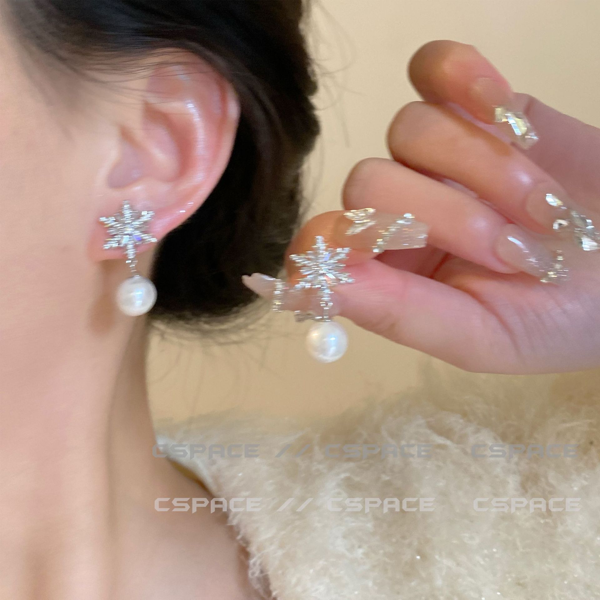 Diseño de nicho de alta gama borla larga sin orejas clip de oreja elegante estilo occidental de las mujeres cara-mirando pequeños nuevos pendientes de moda