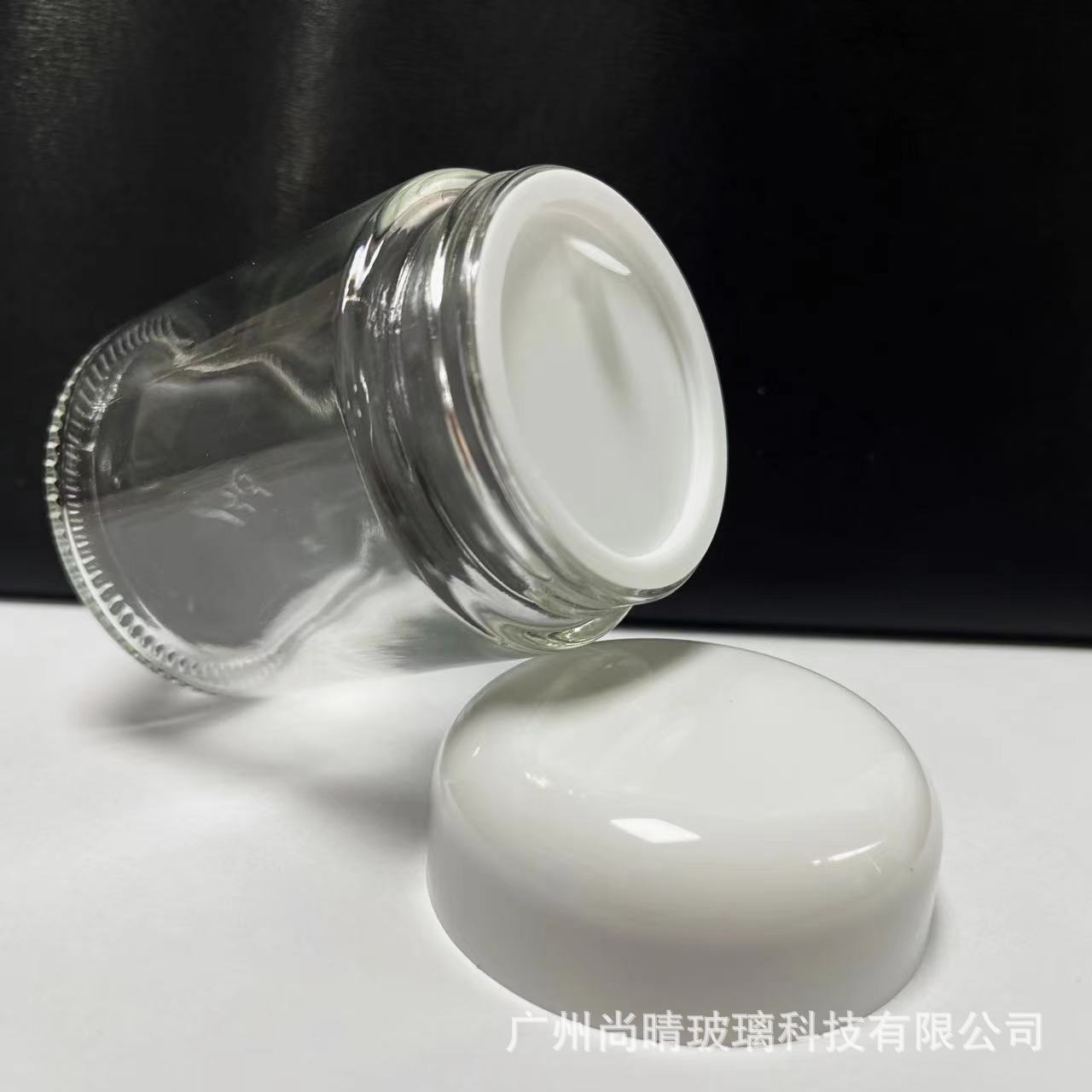 Ventas directas de fábrica 15-100g botella de ungüento de boca ancha transparente cúpula botella de crema cosmética botella de crema de vidrio 50g