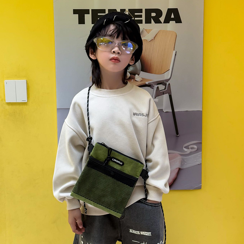 Bolso para niños coreano 2025 nueva moda moda cool bebé mochila accesorios para niños fuera mochila