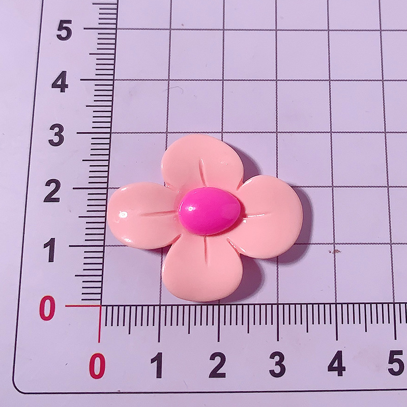 Accesorios de resina de cuatro pétalos de macarrón transfronterizo DiDi accesorios para el cabello de la caja del teléfono móvil agujero de los zapatos colgantes pequeños materiales hechos a mano