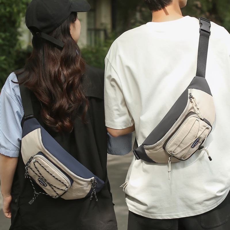 Bolso de pecho casual de moda para hombres 2024 verano nuevo bolso de mano móvil ligero bolso de mano para mujeres mochila de trabajo universal