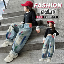 女童破洞牛仔裤春秋2025新款韩版洋气泼墨涂鸦阔腿裤外贸批发跨境
