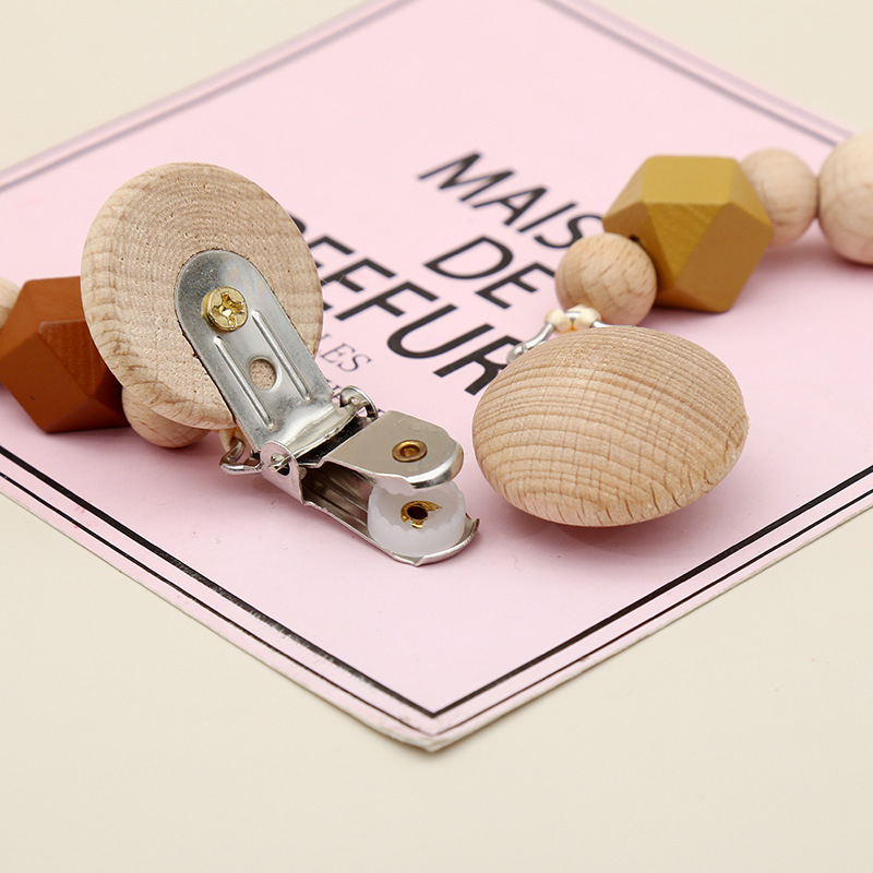 Bebé chupete cadena lindo dibujos animados conejito de lana calmante anti-gota Cadena de madera grano redondo Haya chupete clip al por mayor