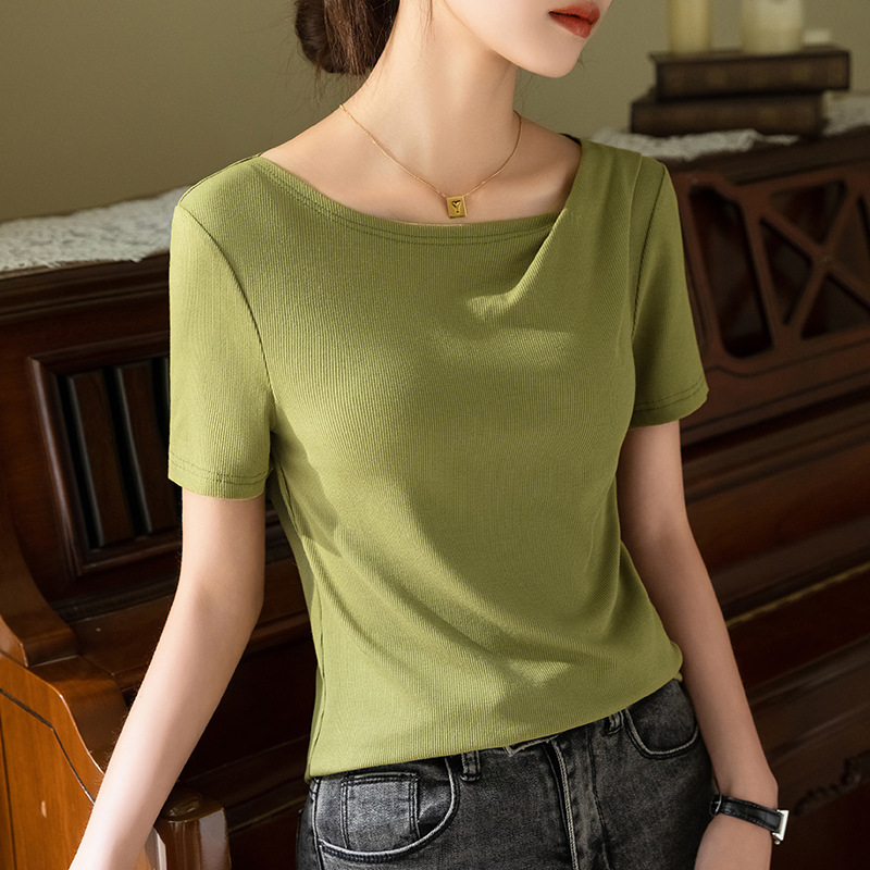 Camiseta modal de manga corta para mujer 2023 nuevas mujeres europeas fuera del hombro swing collar color sólido camiseta plisada cintura superior image 1