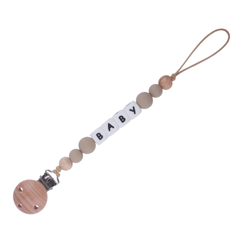 Nuevos suministros para bebés Haya agujero redondo clip bebé creativo DIY chupete Cadena de silicona mordedura de juguete cadena anti-caída