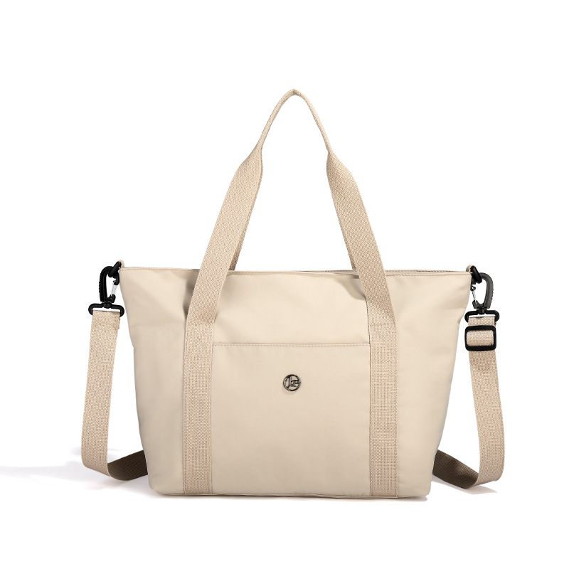 Primavera nueva bolsa de viaje impermeable de gran capacidad de alto valor, bolsa diagonal de un solo hombro para mamá de compras portátil de moda
