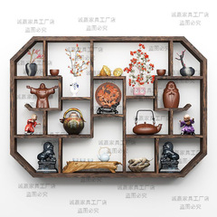 新中国式の実木棚に壁の壁掛け式の茶器棚を掛けます。