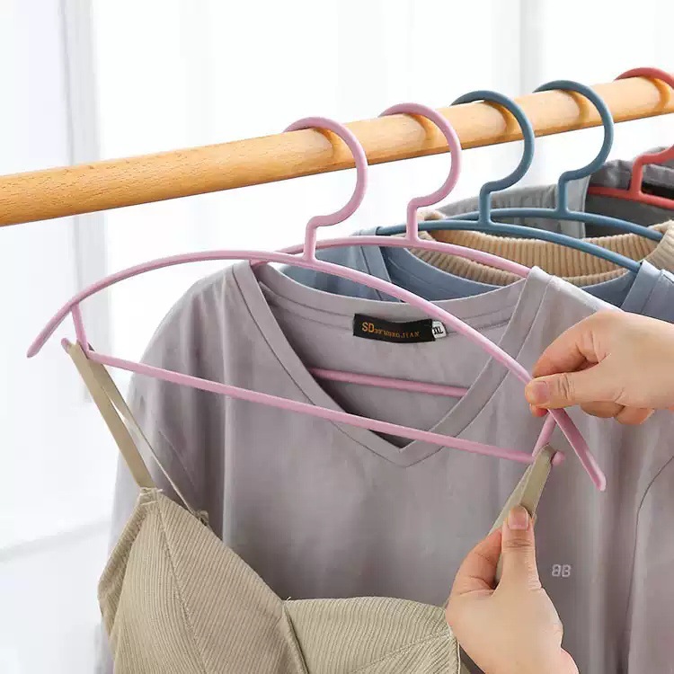 Percha de ropa antideslizante semicírculo sin costuras anti-bolsa percha de ropa de color nórdico engrosada percha de ropa de plástico percha de ropa sin costura soporte de ropa
