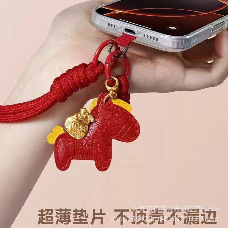 Año del Caballo cadena de teléfono móvil rojo nuevo tipo de pulsera teléfono móvil cuerdas de muñeca tejiendo robusto cuero accesorios de caballo colgantes