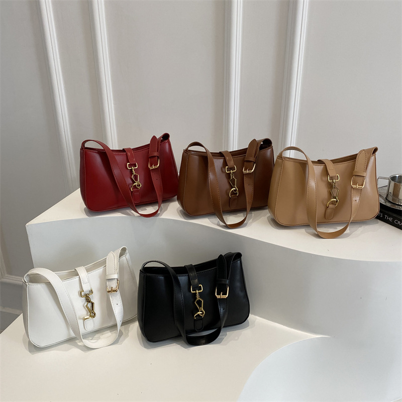 Textura de la bolsa de hombro de la mujer de la primavera de 2025 nueva bolsa de mochila en el temperamento elegante bolso cuadrado