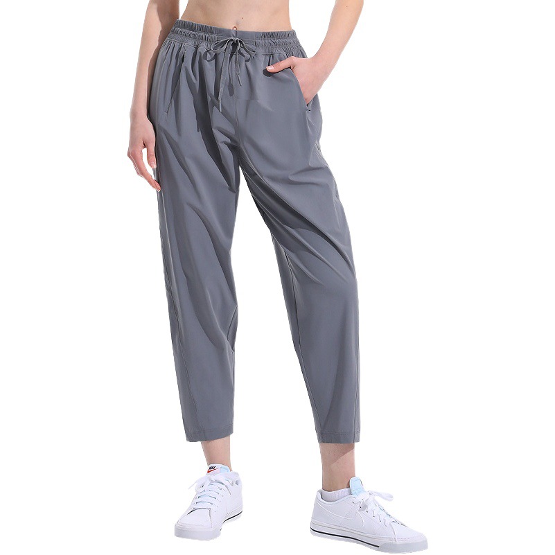 Nuevos pantalones casuales deportivos sueltos delgados transpirables cómodos pantalones de yoga para adelgazar Mediados de cintura danza fitness pantalones recortadas mujeres