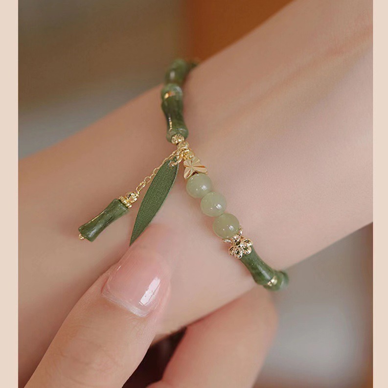 A retro Chinese-style olive jade bamboo joint bracelet for women, with a unique design and simple charm. A new Chinese-style Hetian jade bracelet for women, 253 undefined