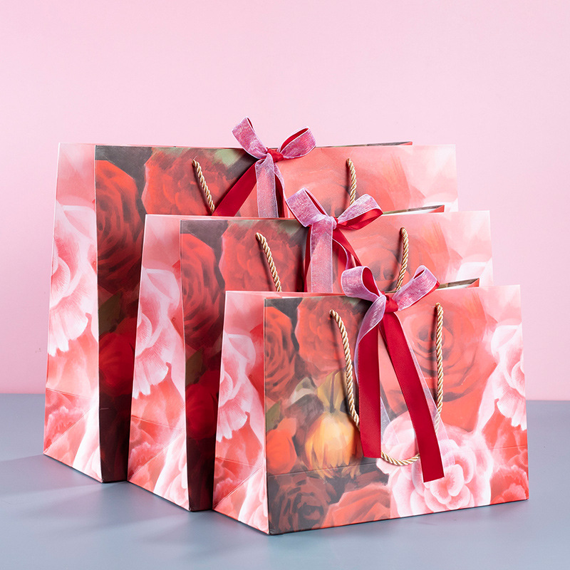 Bolsa de regalo de mano festiva roja bolsa de regalo de vacaciones tienda de ropa de mujer bolsa de compras bolso bolsa de papel