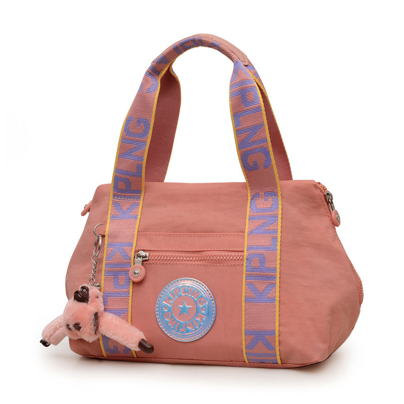 New KP Women's Shoulder Bag Water-repellent Nylon Cloth Crossbody Bag Ultra Light New Standard Monkey Pendant Women's Shopping Crossbody Bag