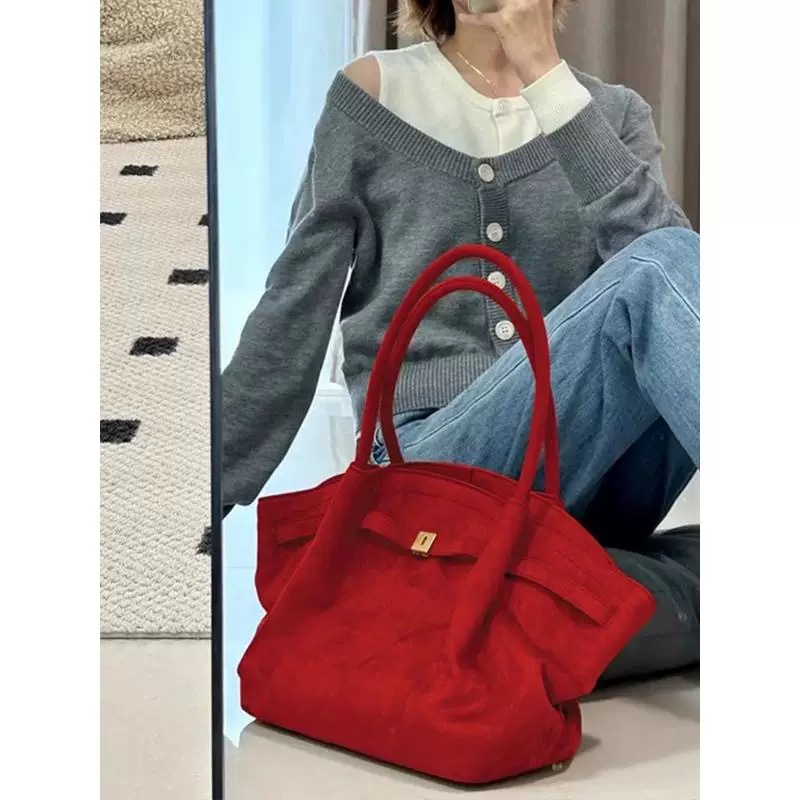 Bolsos de albóndigas de gran capacidad de muntjac rojo estilo femenino 2025 nuevo sentido de alta gama bolsos de bodas de novia de otoño e invierno