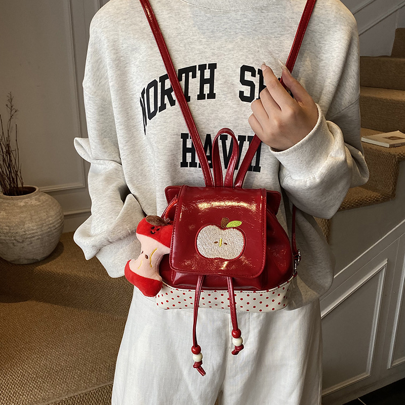 2025 nueva mochila infantil de alto valor de cara caricatura adorable manzana pequeña mochila para niños y niñas, mochila para niños