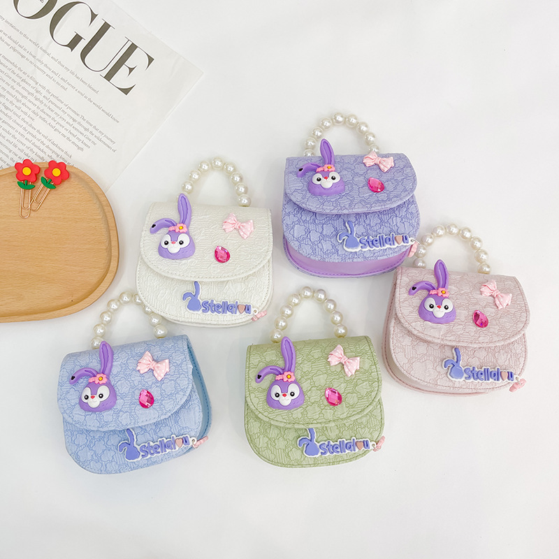 Bolso de los niños al por mayor bolsa de mensajero de las niñas bolso de perlas de moda de dibujos animados accesorios bolsa estrella Delu mochila