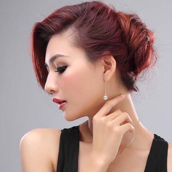 Long fashionable Korean elegant earrings from pearl with tassels