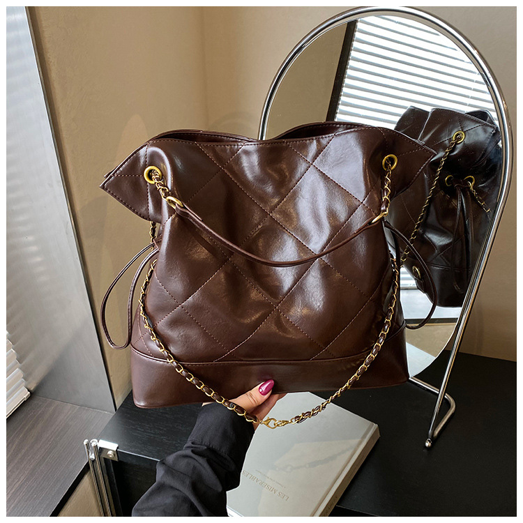 Bolsa de hombro de viaje coreano, cadena de cuadrícula, bolsa de tote universal para mujeres 2025, nueva mochila casual de tres usos