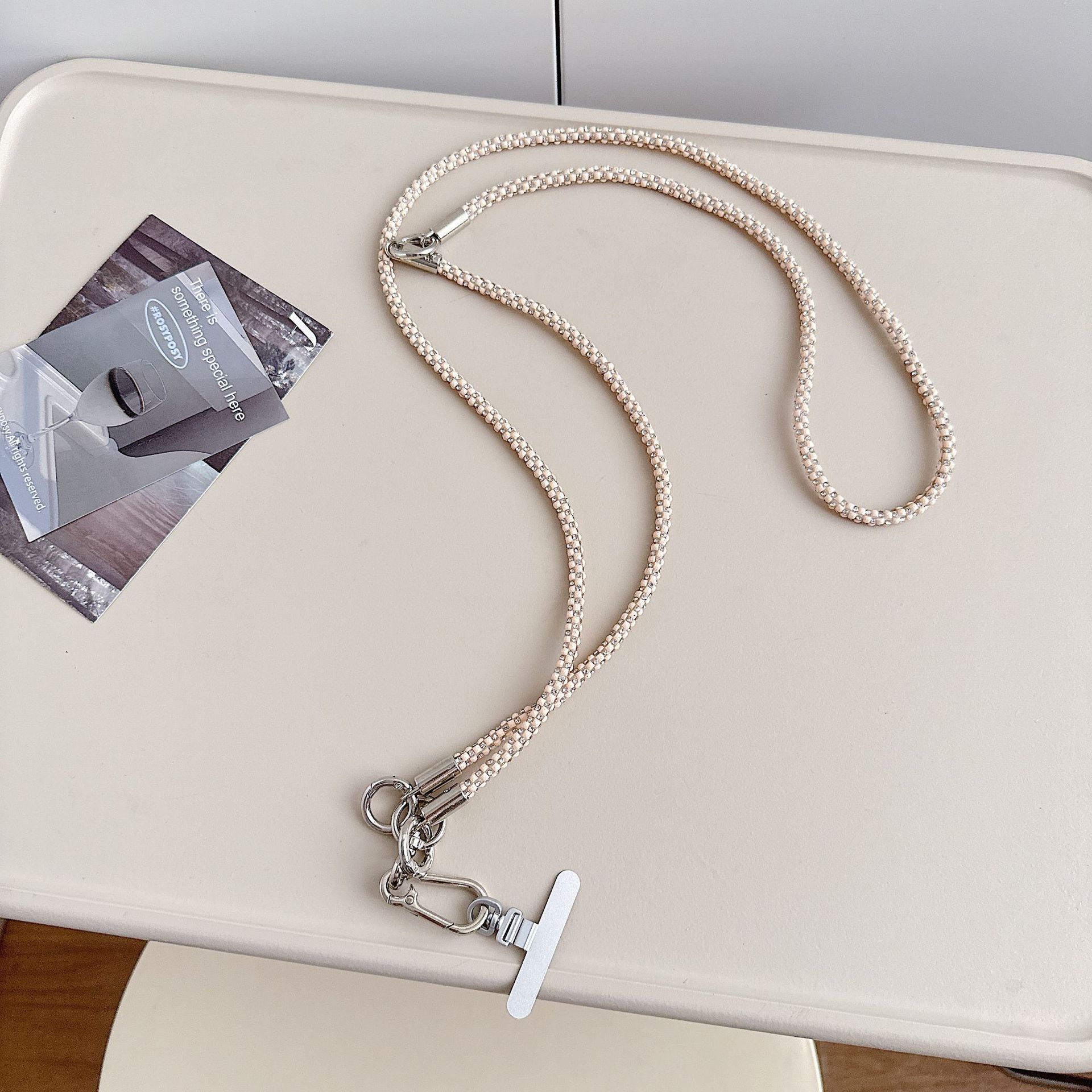 Cadena de teléfono móvil de alta gama hecha a mano de boutique, cordón de teléfono móvil de moda tres en uno de diamantes de lujo, mensajero largo/colgante