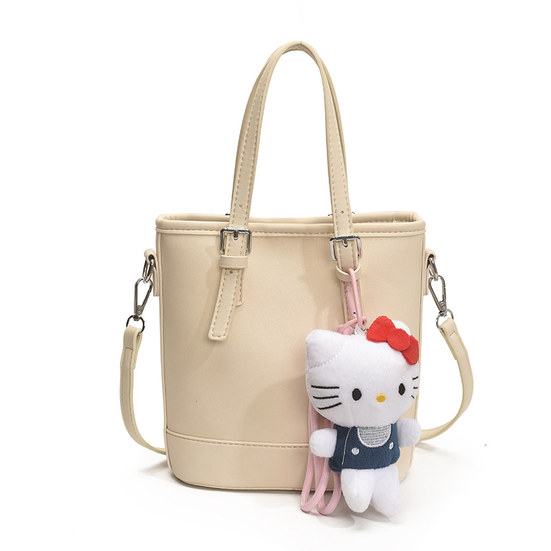 2025 nuevo bolso de cubo portátil de diseño de nicho bolso de hombro de viajero de todo fósforo de moda femenina bolso de mensajero de estilo occidental de color sólido