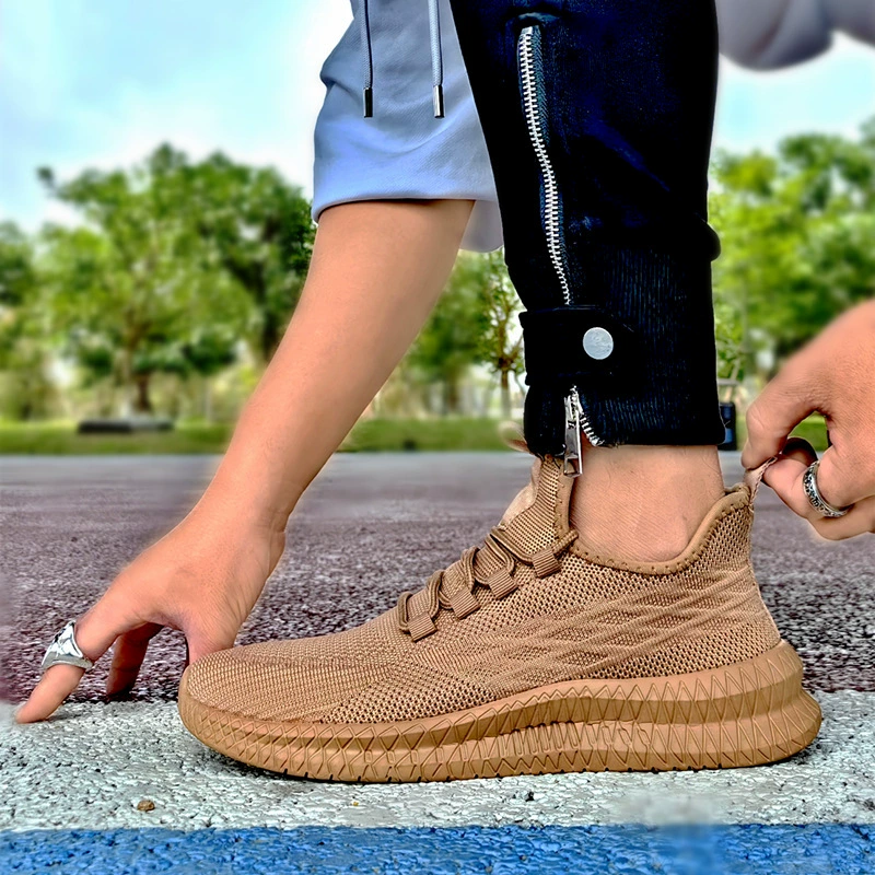 Летающая вязаная мужская обувь повседневная мода простой дышащий легкий большой размер мужской обуви производитель оптовая торговля трансграничная модная обувь мужской