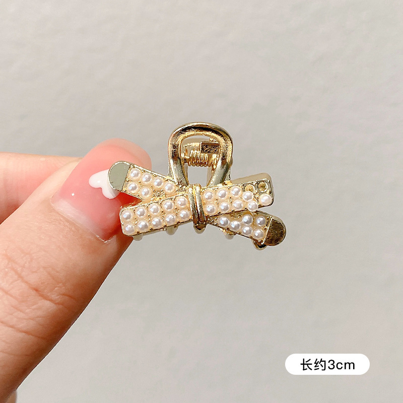 Pequeñas pinzas de cabello de perla temperamento feminino medio agarrado pinzas de cabello de borde pequeño adornamiento de cabeza de alto nivel no lastimar pinzas de cabello