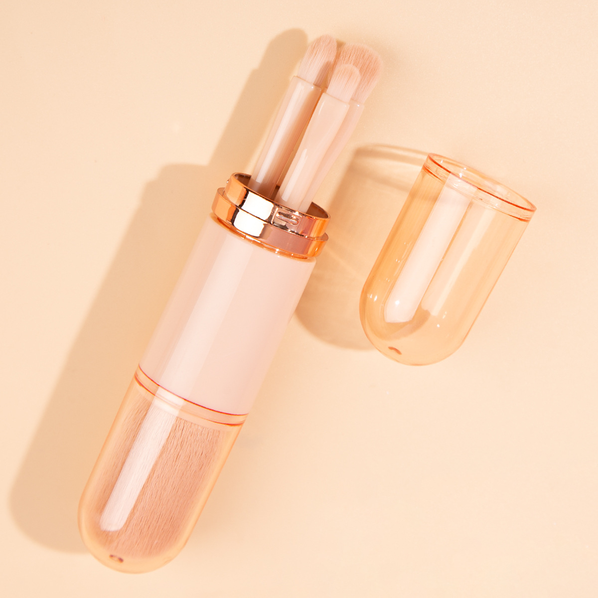 Nuevo portátil multi-funcional a prueba de polvo retráctil polvo suelto rubor sombra de ojos cepillo de labios mini Cuatro en Uno cepillo de maquillaje