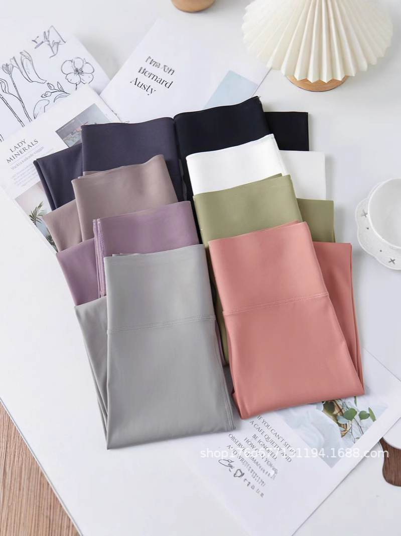 Pantalones de tiburón de nueve puntos de explosión transfronteriza primavera y otoño vestimenta exterior de mujer abdominal de elevación de cadera de acondicionamiento físico pantalones de tiburón
