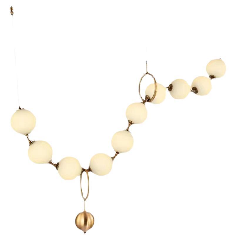 Luz francesa del restaurante de frijoles mágicos moderno simple bronce collar de perlas lámpara de bar largo loft Buda perlas lámpara de bar