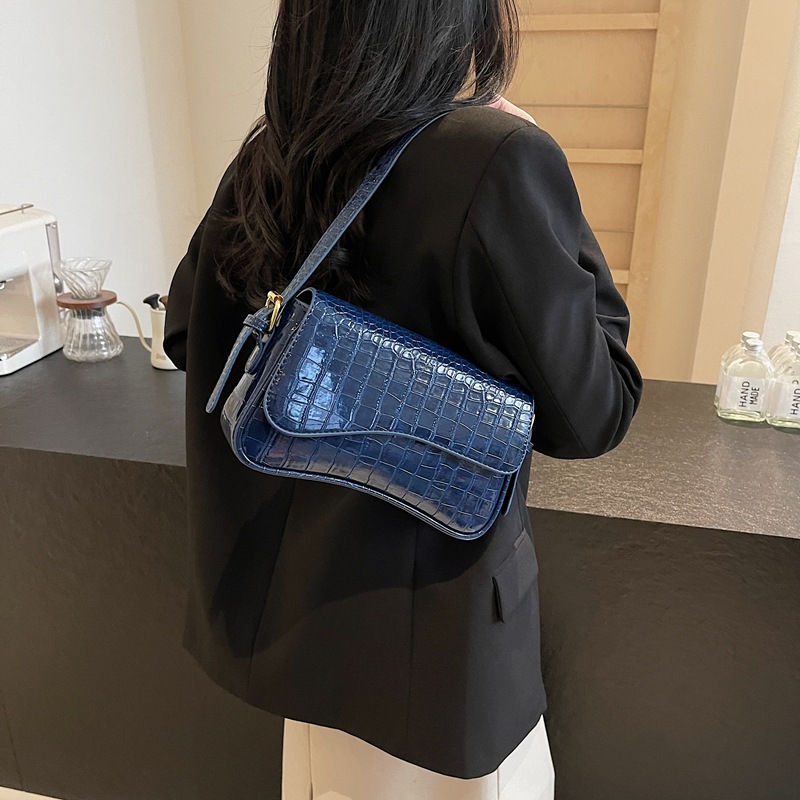 2024 nuevo estilo PU de color sólido moda personalidad diaria patrón de piedra simple bolso de hombro bolso de axila con hebilla de metal