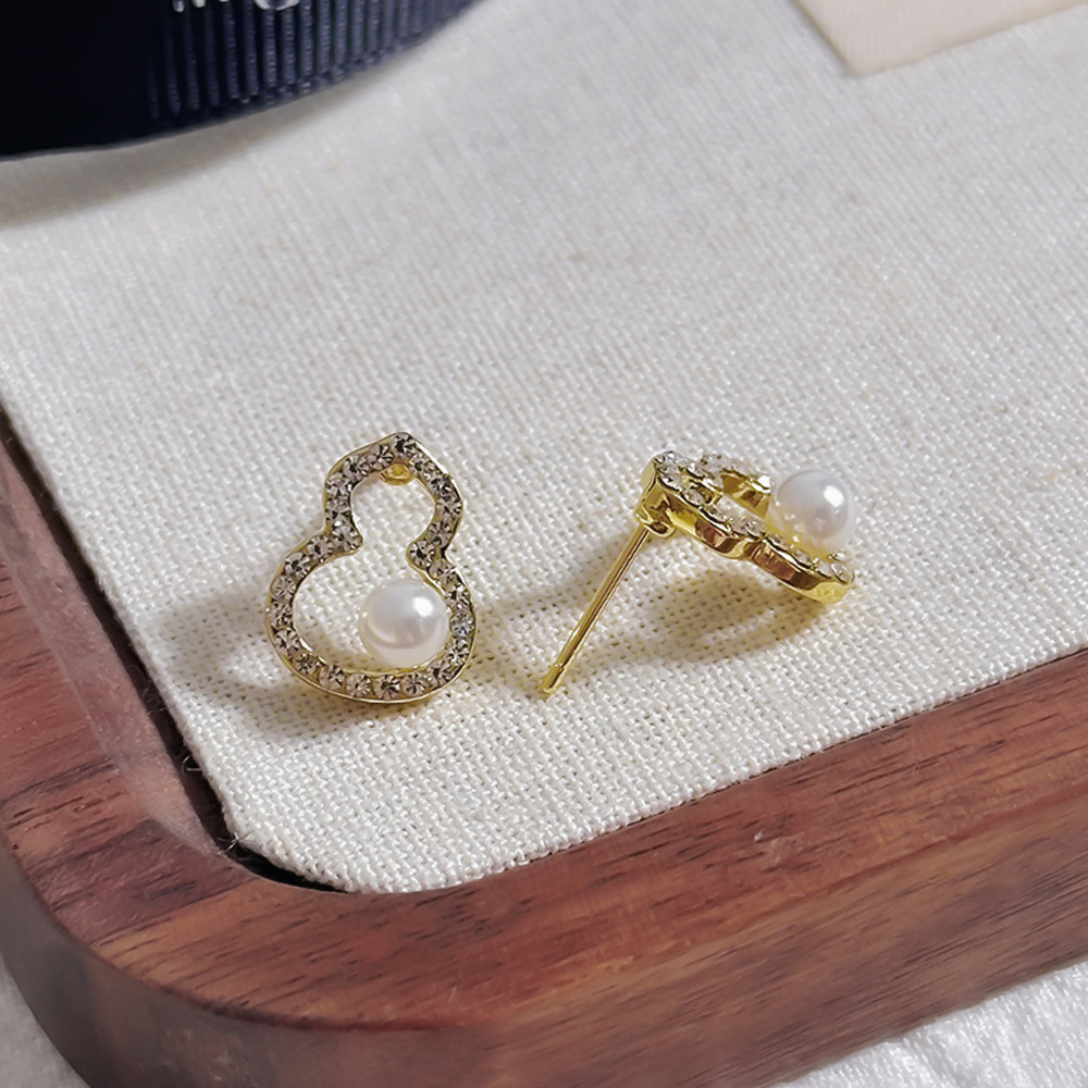 Aguja de plata de moda alta sensación de diamante de goteo de aceite pendientes nicho universal elegante pernos de orejas ligero lujoso temperamento simple orejas para mujeres