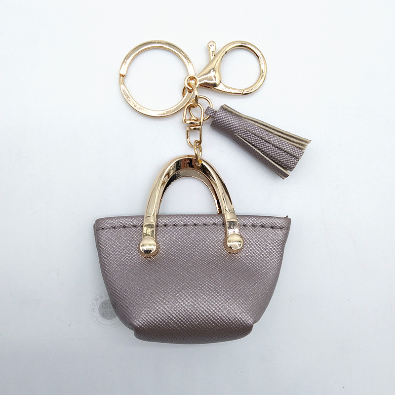 Llavero para mujer, bolso, colgante, joyería, mini monedero de almacenamiento de cuero lindo europeo y americano