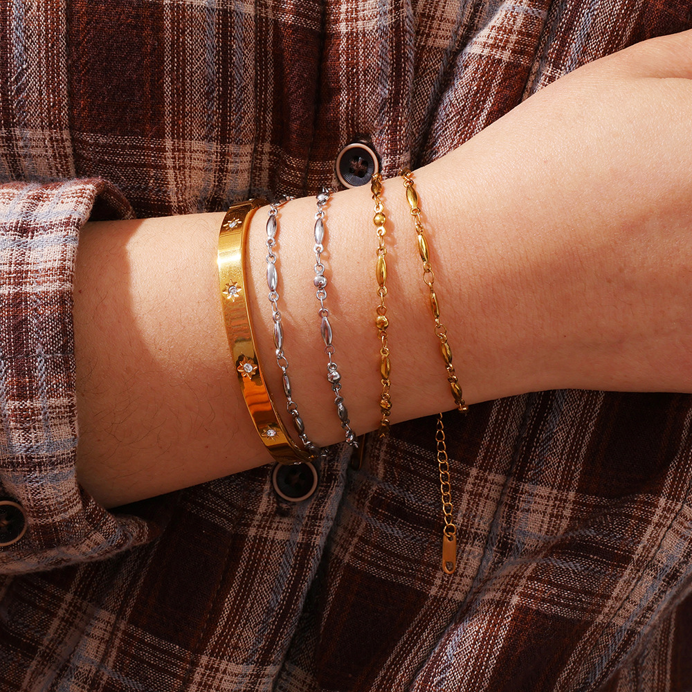 Exclusividad transfronteriza para INS Minimalista Cadena de semillas de melón de 18 quilates Collar de todo fósforo Conjunto de pulsera Fábrica de joyas al por mayor