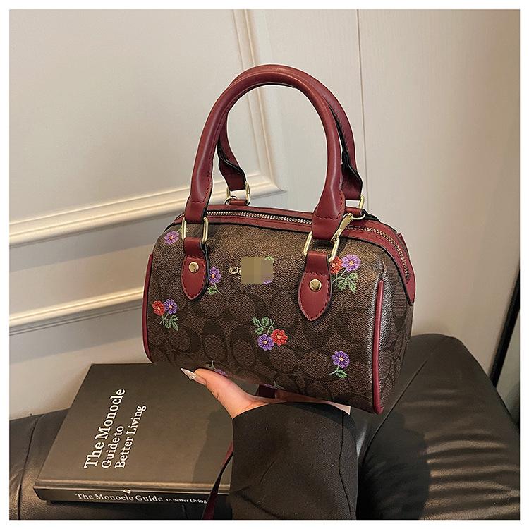 Bolso transfronterizo de Boston para mujer este año nuevo bolso de almohada impreso de alta gama bolso de mensajero de hombro simple urbano