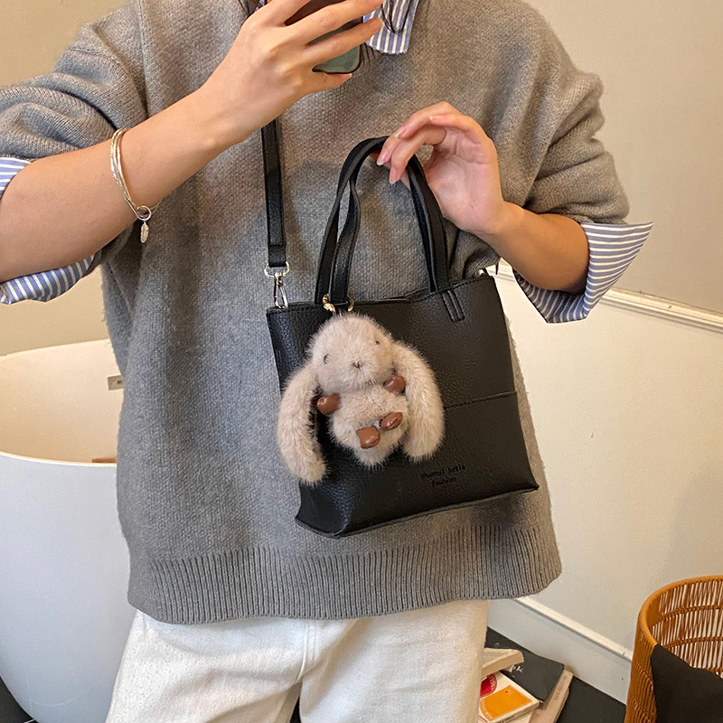 Bolso de cubo de mano coreano, bolso de hombro para mujeres extranjeras 2025, nuevo estilo de alta calidad, simple bolso de transporte