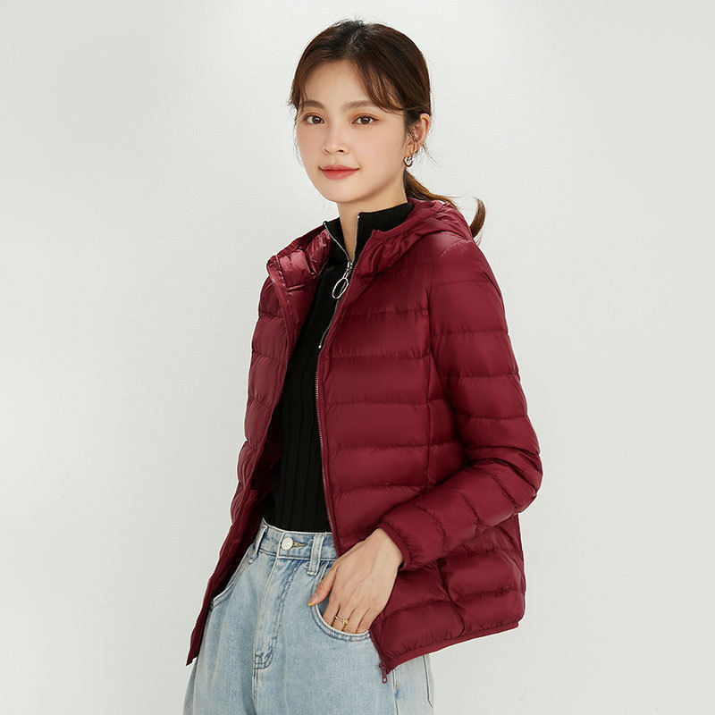 90 chaqueta de plumón de mujer con capuchón ligero corto de tamaño grande ligero estilo extranjero chaqueta de plumón blanco chaqueta Pinghu al por mayor
