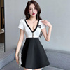 A waist up dress that covers the belly and has a low cut， making you look slimmer