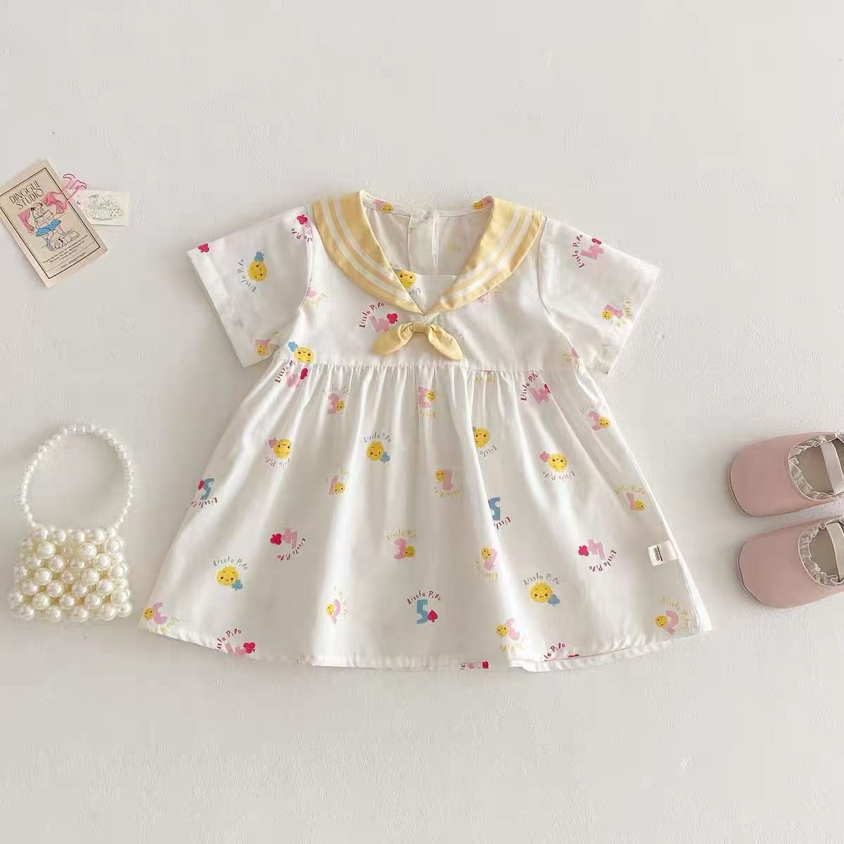 Vestido súper lindo para niñas nuevo verano bebé lindo vestido de manga corta de dibujos animados de verano azul marino