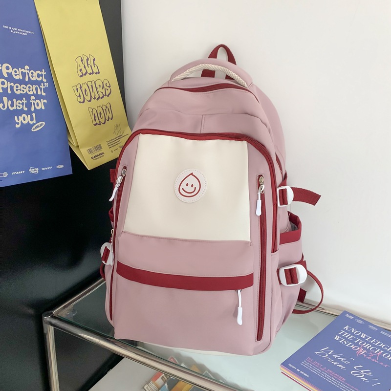 Mochila de lona coreana simple y versátil para mujeres 2023 nueva bolsa de gota de lluvia de gran capacidad mochila de ocio mochila de estudiantes