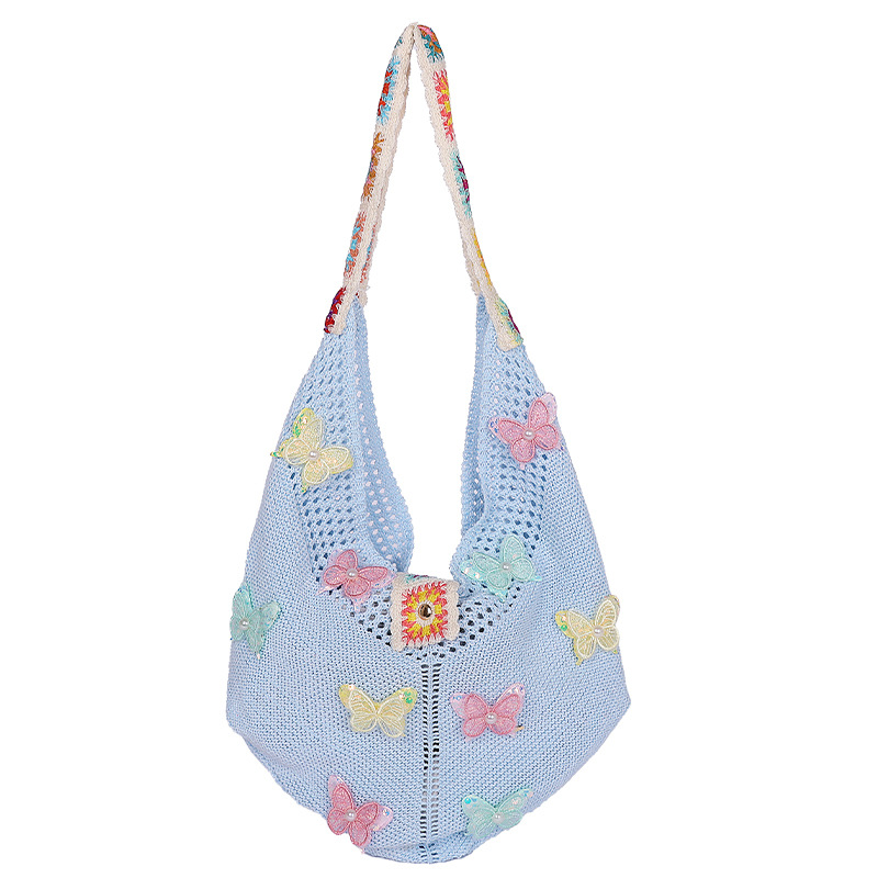 Versión coreana del bolso de nicho 2025 verano nuevo bolso femenino mariposa bolso tejido bolso de hombro de punto de gran capacidad