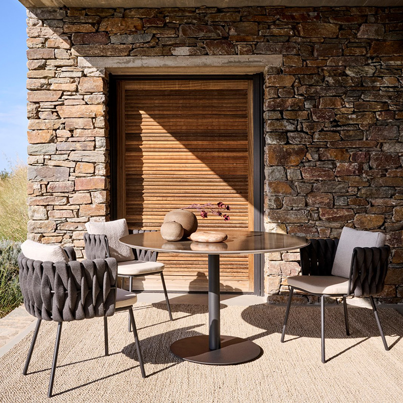 Mesa y silla de cordón al aire libre patio jardín balcón al aire libre mesa de comedor de hotel simple villa combinación silla de caña