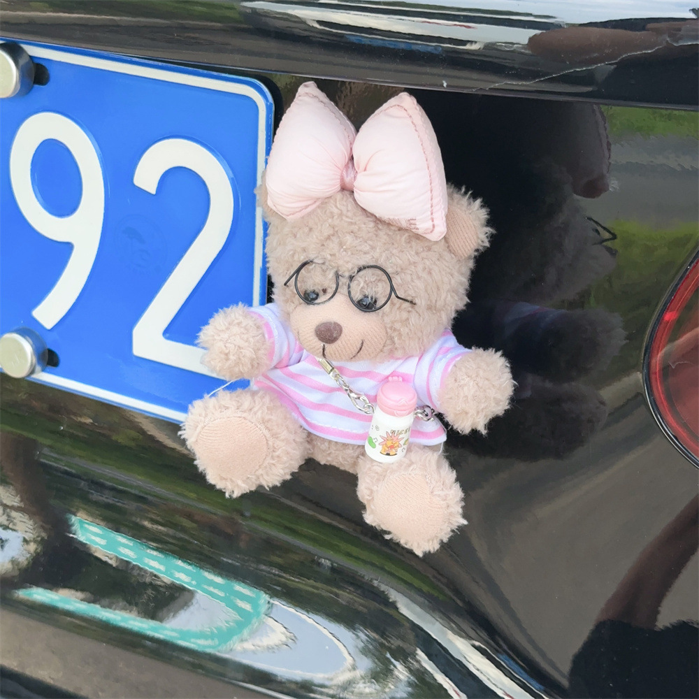 Personalidad encantadora del oso en línea decoración de la cola del automóvil adornos muñecas de peluche fuera del automóvil suministros de automóvil estables
