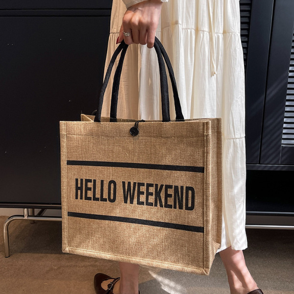Capacious shoulder bag